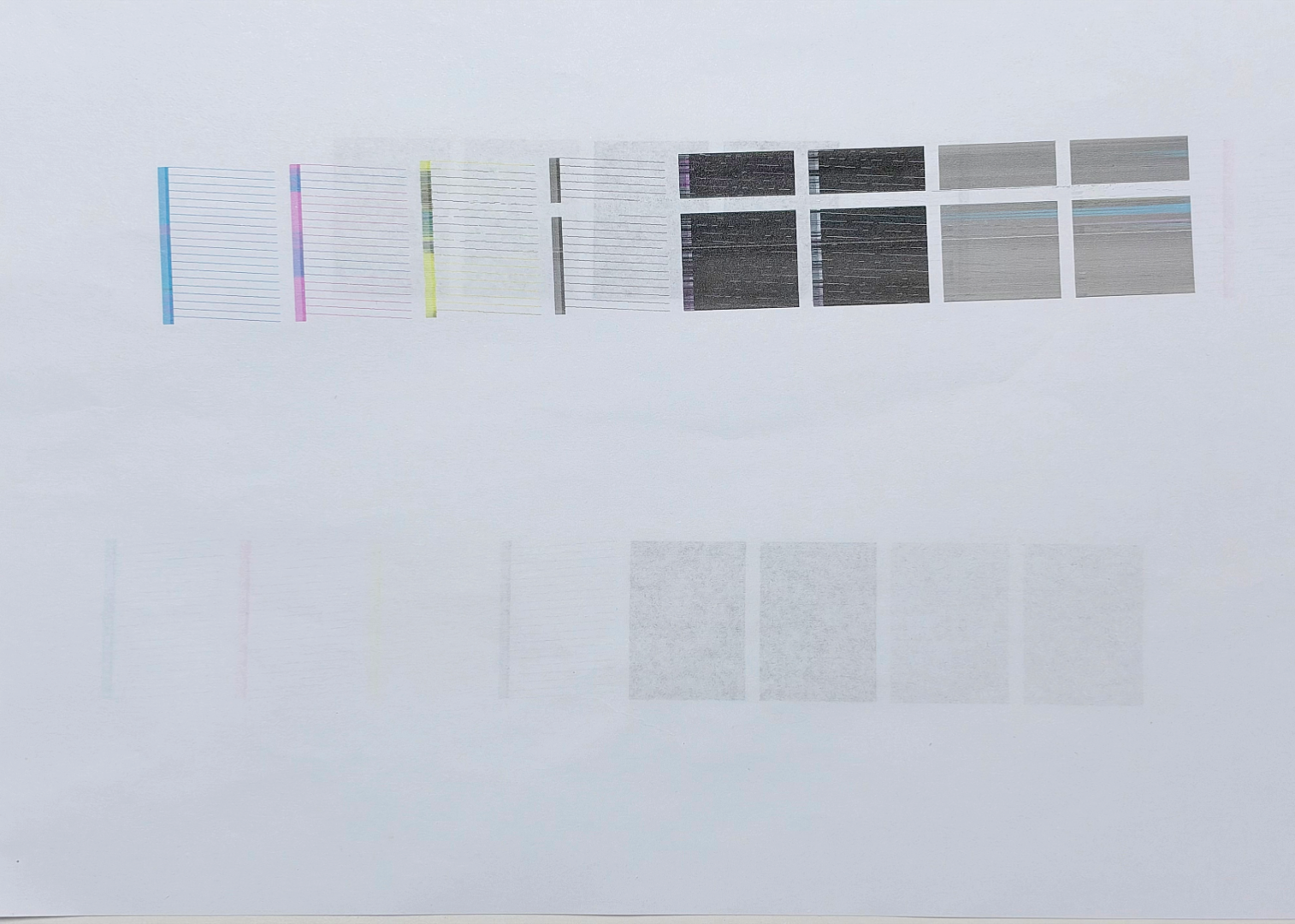 Test print showing missing nozzles and color mixing